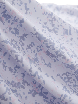 Close-up texture of pink purple rose women's sleeveless v-neck print golf shirts fabric showing printed weave detail.