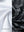 Fabric close-up of trendy print fleece hoodies, plush texture with warm dark camouflage feel