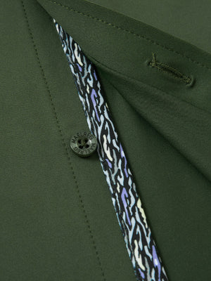 Detail view of buttons on military green cool print plain button up shirts