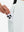 Side view of pocket on white women's lightweight athletic sweatpants