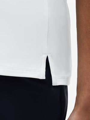 Detail view of hem on white women's 4 buttons golf polo shirts