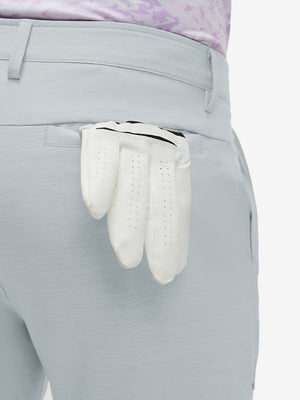 Detail view of back pocket on newport blue straight fit lightweight dress golf pants