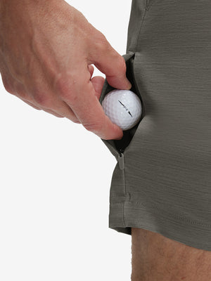 Detail view of stretch fabric on tea brown flat front hybrid golf shorts