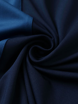 Texture close-up of Moisture wicking color block polo shirts with soft feel and navy detail