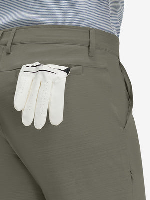 Detail view of back pocket on tea brown straight fit lightweight dress golf pants
