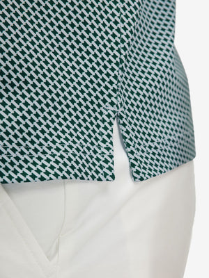 Detail view of hem on dark green oval premium ribbed collar print polo shirts