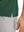 Detail view of hem on green classic lightweight jacquard golf shirts