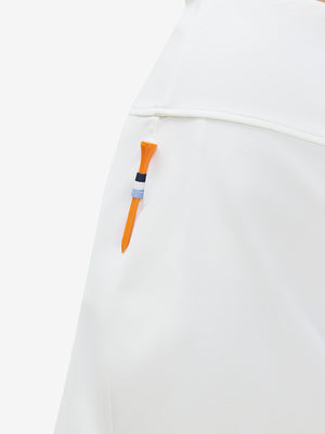 Side detail of white high waist built-in short a-line golf skirt with 5 pockets
