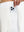 Detail view of side pocket on white women's gym golf shorts with liner pocket