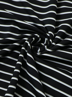 Close-up of black/white stripe popular yarn dyed stripe polo fabric showing crisp lines and soft texture.