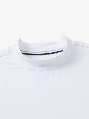 Detail view of mock neck on white women's moisture-wicking mock neck sleeveless golf tops