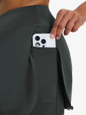 Detail view of side pocket on dark grey women's gym golf shorts with liner pocket