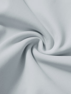 Fabric close-up of misty grey lightweight ankle-zip sweatpants with 4 pockets, breathable performance material.