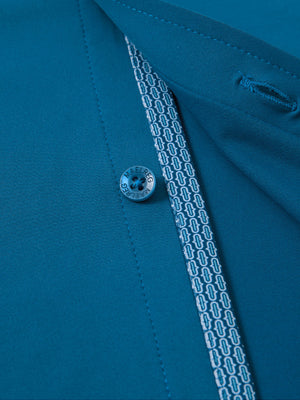 Detail view of buttons on blue cool print plain button up shirts