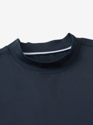 Detail view of mock neck on navy blue women's moisture-wicking mock neck sleeveless golf tops