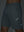 Detail of glow in the dark feature on grey blue 4 way stretch breathable workout athletic shorts