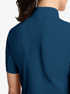 Detail view of back design on blue women's breathable 1/4 zip pullover golf shirts
