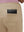 Back view of pocket on light khaki women's high waist stretch golf pants with pockets