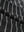 Close-up texture of stretch limo/ltgrey heather non-curl ribbed collar striped polo shirts fabric showing striped weave detail