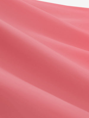 Close-up texture of pink women's collared v neck quick dry tank tops fabric showing weave detail.
