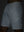 Detail of glow in the dark feature on white 4 way stretch breathable workout athletic shorts
