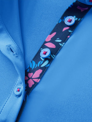 Detail view of collar and buttons on sky blue women's 5 buttons collared polo shirts