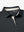 Collar and button detail close-up in black heather of performance heather contrast collar polo shirts.