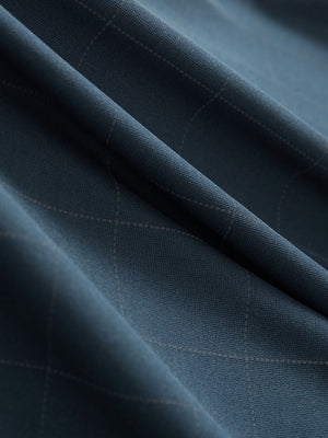Close-up texture of dolphin grid performance reflective checked collar golf shirt fabric showing weave detail.