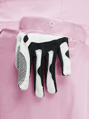 Detail view of pocket on light pink women's stretch a-line golf skort with 7 pockets