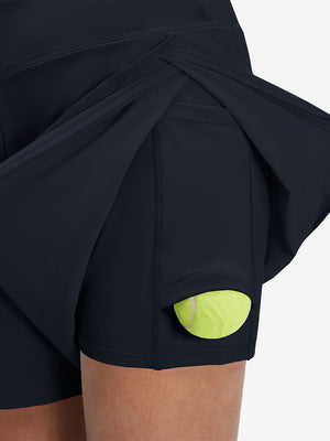 Detail view of side inner pocket on navy blue women's gym golf shorts with liner pocket