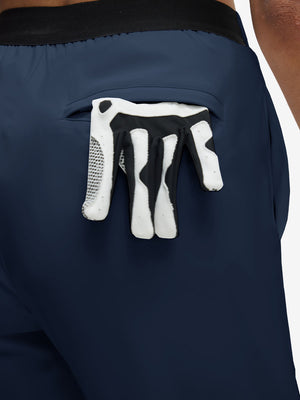 Back view of pocket on navy women's lightweight athletic sweatpants