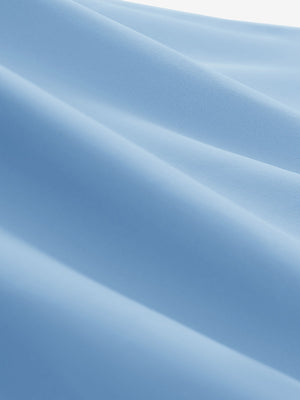 Close-up texture of light blue women's collared v neck quick dry tank tops fabric showing weave detail.