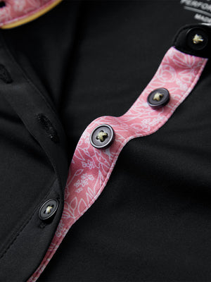 Detail view of collar and buttons on black women's 5 buttons collared polo shirts