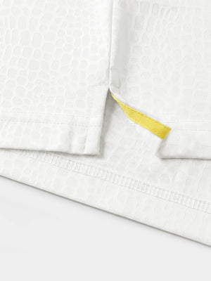 Hem detail close-up in white of nylon blend casual jacquard polo shirts.