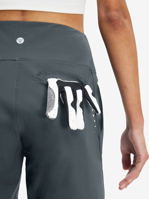 Back side view of pocket on dark grey women's high waist 2 in 1 quick dry shorts with 7 pockets
