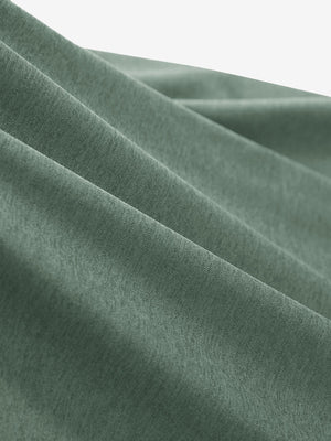  Close-up view of soft heather fabric texture and fine knitting craft, performance heather contrast collar polo shirts in celadon green heather