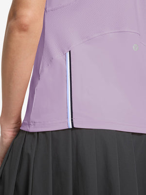 Detail view of hem design on pinkish purple women's breathable 1/4 zip pullover golf shirts