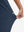 View showing loose fit of navy women's lightweight athletic sweatpants