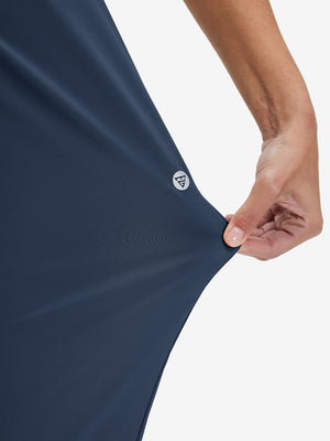 View showing loose fit of navy women's lightweight athletic sweatpants