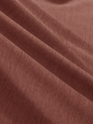  Close-up view of soft heather fabric texture and fine knitting craft, performance heather contrast collar polo shirts in red ochre heather