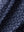 Macro view of the dark blue golf club 4 way stretch print collared polo shirt fabric, showcasing the unique print design