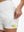 Inside view of pocket on white women's high waist 2 in 1 quick dry shorts with 7 pockets
