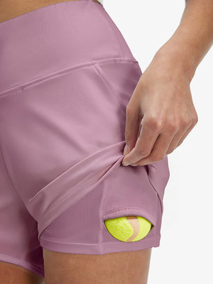 Inside view of pocket on lavender pink women's high waist 2 in 1 quick dry shorts with 7 pockets