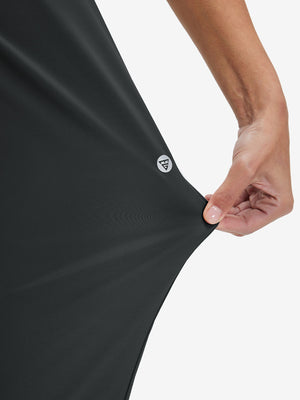 View showing loose fit of black women's lightweight athletic sweatpants