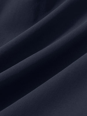 Close-up texture of navy women's high waist 2 in 1 quick dry shorts with 7 pockets fabric showing weave detail.