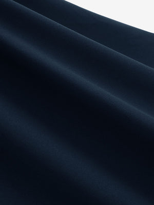 Close-up texture of navy women's breathable 1/4 zip pullover golf shirts fabric showing breathable weave detail.