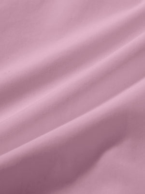 Close-up texture of lavender pink women's high waist 2 in 1 quick dry shorts with 7 pockets fabric showing weave detail.