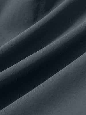 Close-up texture of dark grey women's high waist 2 in 1 quick dry shorts with 7 pockets fabric showing weave detail.