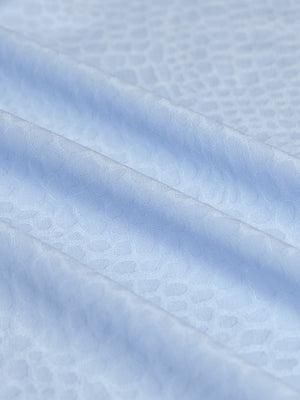 Clear close-up of exquisite jacquard fabric grain and nylon blend texture, nylon blend casual jacquard polo shirts in light blue