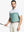 Half-body front shot holding golf club in BERYL GREEN Premium Performance Polo